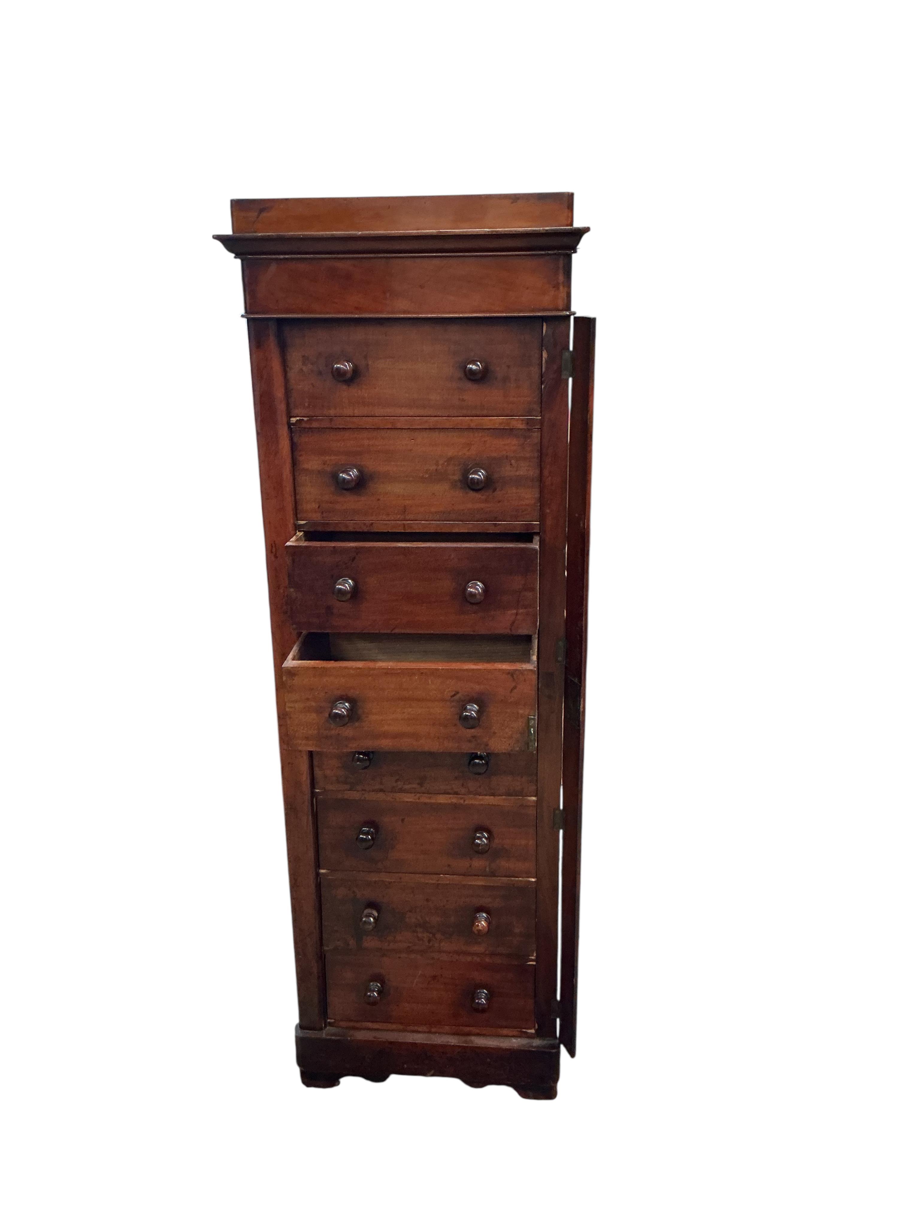 A Victorian mahogany Wellington chest, width 53cm, depth 35cm, height 158cm